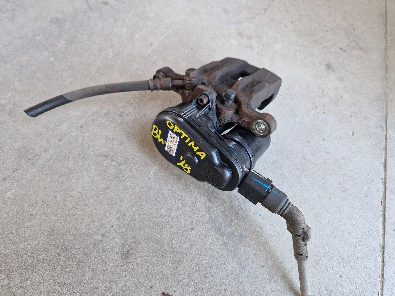 KIA OPTIMA (JF) Bal hátsó kézifék motor, féknyereg A5582-37700